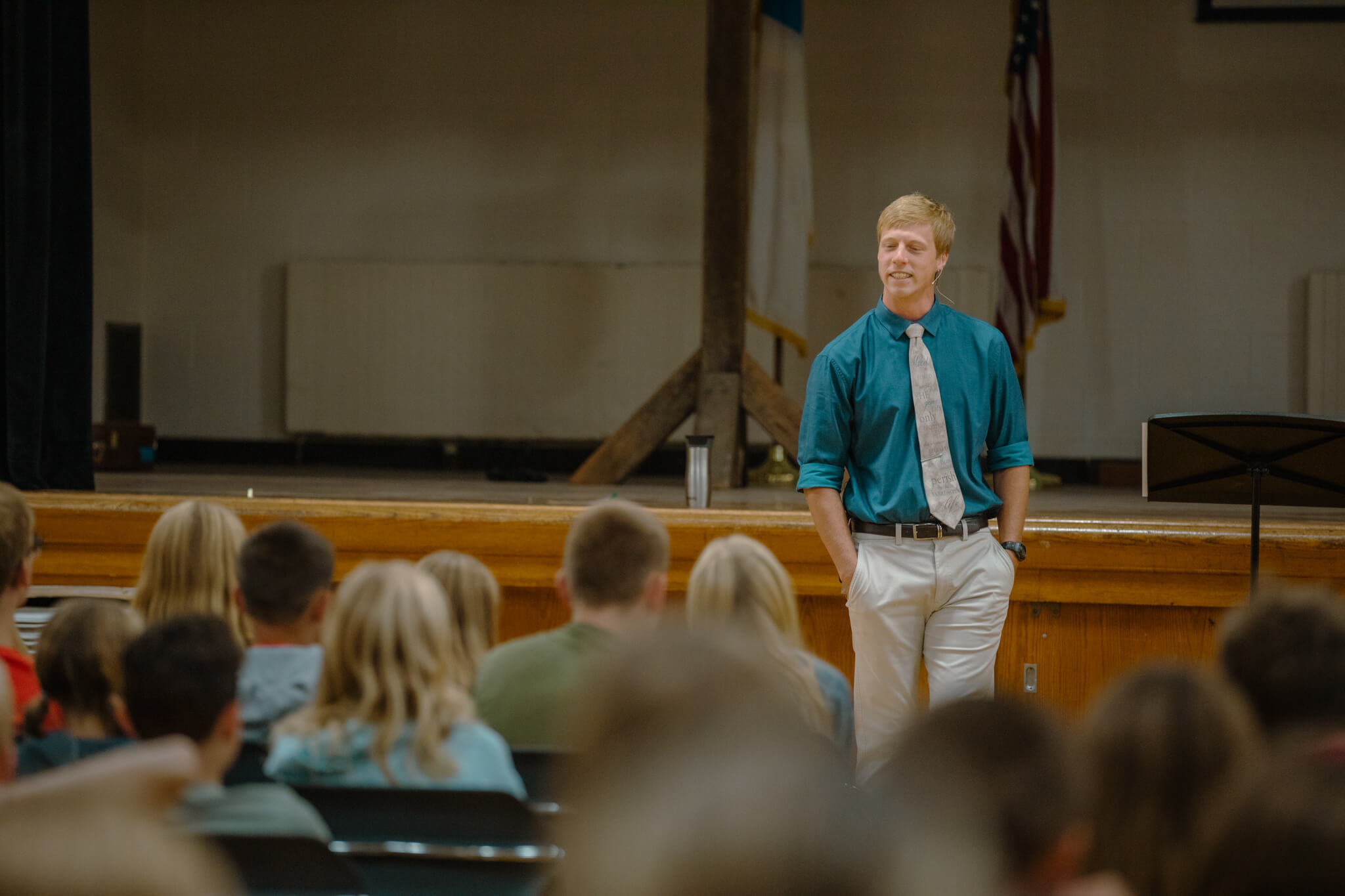 Middle school teacher leading chapel at Hudsonville Christian School.