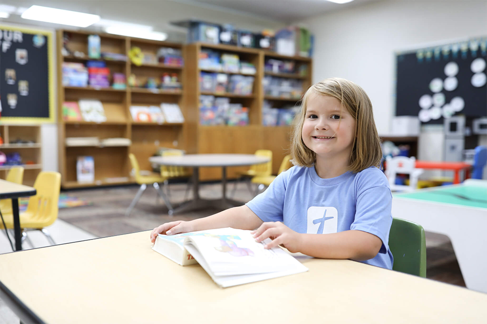 Little girl reading at Hudsonville Christian School