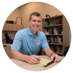 The middle school principal sitting in his office at Hudsonville Christian School in Michigan.